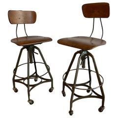 Pair Of Industrial Adjustable Drafting Stools By Toledo Metal Furniture Co.