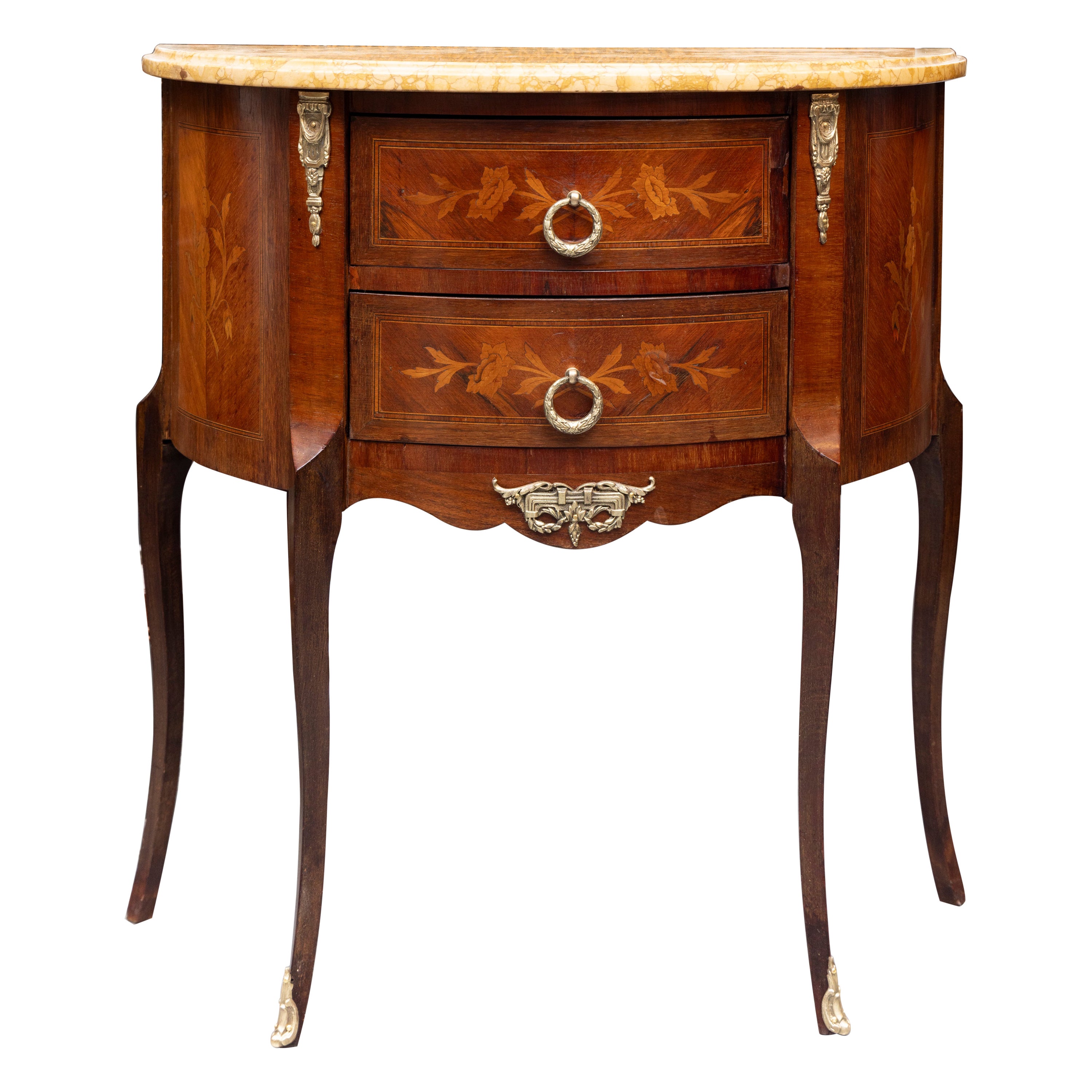 This is one of a pair of Louis XV style mahogany inlaid commodes with a sienna marble top over two inlaid drawers, supported by slender cabriole legs with brass mounts. Pair available, sold individually.