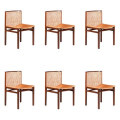 Tito Agnoli Cane and Patinated Cognac leather dining room chairs, Italy 1966