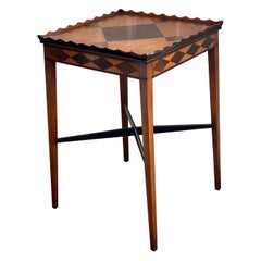 A.C. Satinwood and Mahogany Inlaid Ebonized Side Table