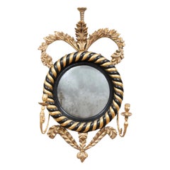 Miroir Girandole à deux lumières de style Régence, ébonisé et doré à la parcelle
