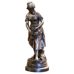 19th Century French Spelter Female Statue with Bird Nest "Le Nid by L. Gregoire”