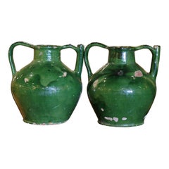 Pair of 19th Century French Green Glazed Terracotta Pitchers from Provence