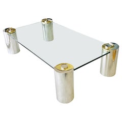 Table basse en laiton poli et verre à miroir de Karl Springer