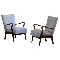 A Pair of Danish Mid Century Modern Lounge Chairs in Bouclé & Beech, 1960s