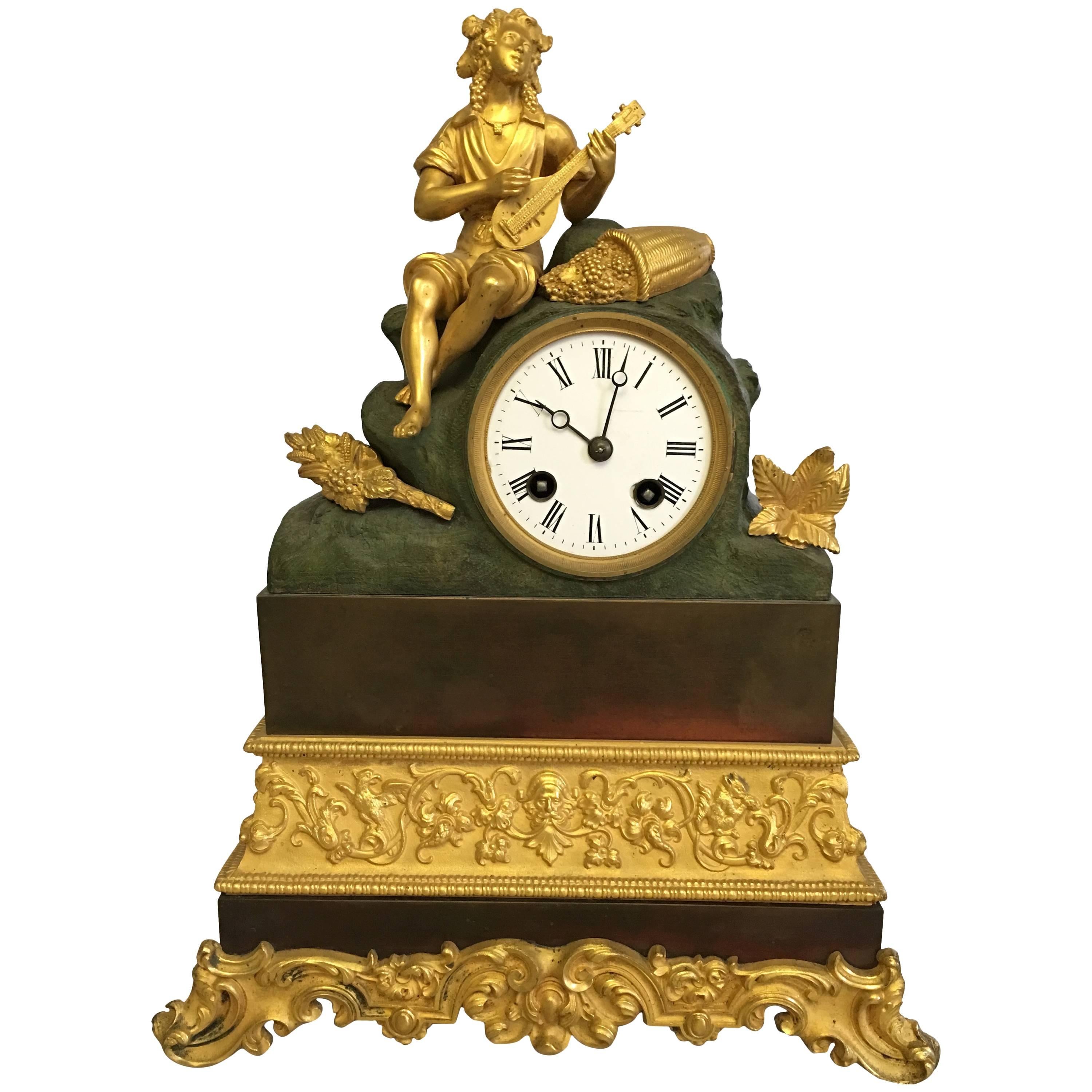 Antique Bronze and Partly Gilded Bracket Clock with Sitting Dionysus For Sale