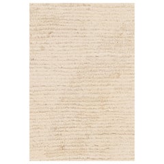 Alfombra de textura moderna Rug & Kilim en beige y crema con motivos acanalados