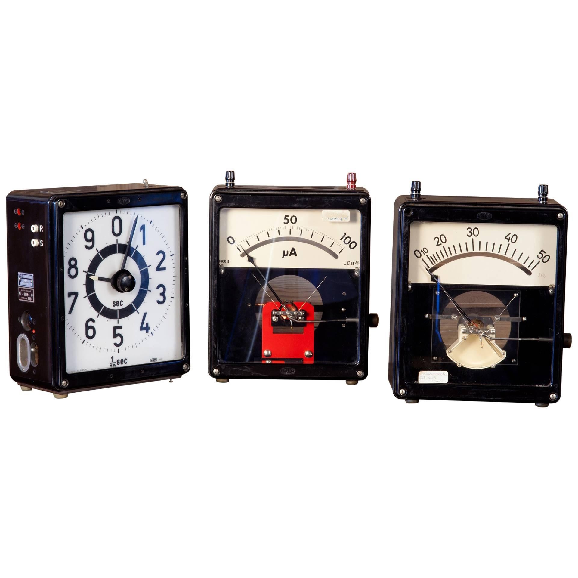 Collection of Vintage German Metal Timers and Voltmeters