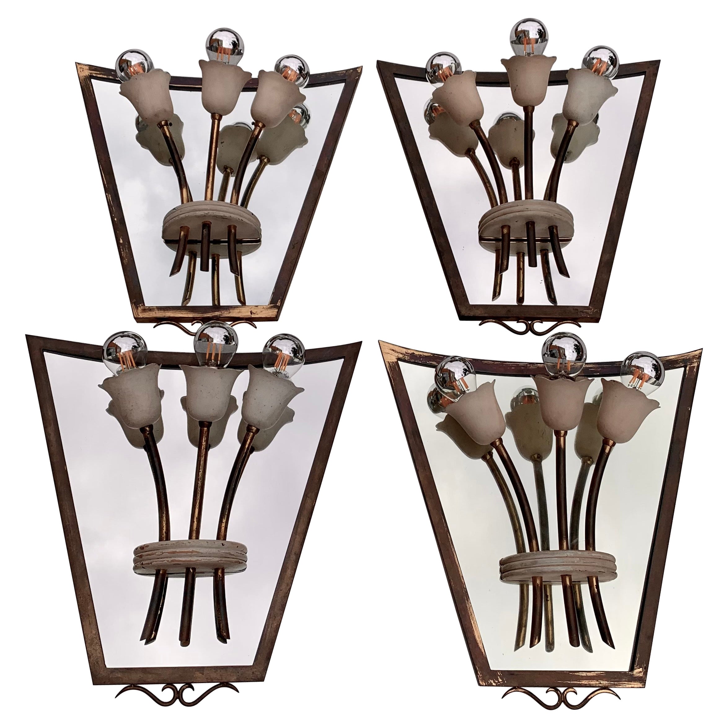 Set of four 1940s brass and mirror sconces