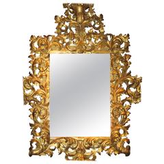 Miroir baroque italien dramatique en bois doré