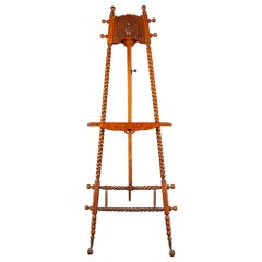 Victorian Oak Easel with Hand-Carved Peacock Motif and Brass Claw Feet