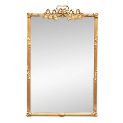French Style Carved And Gilt Beveled Mirror