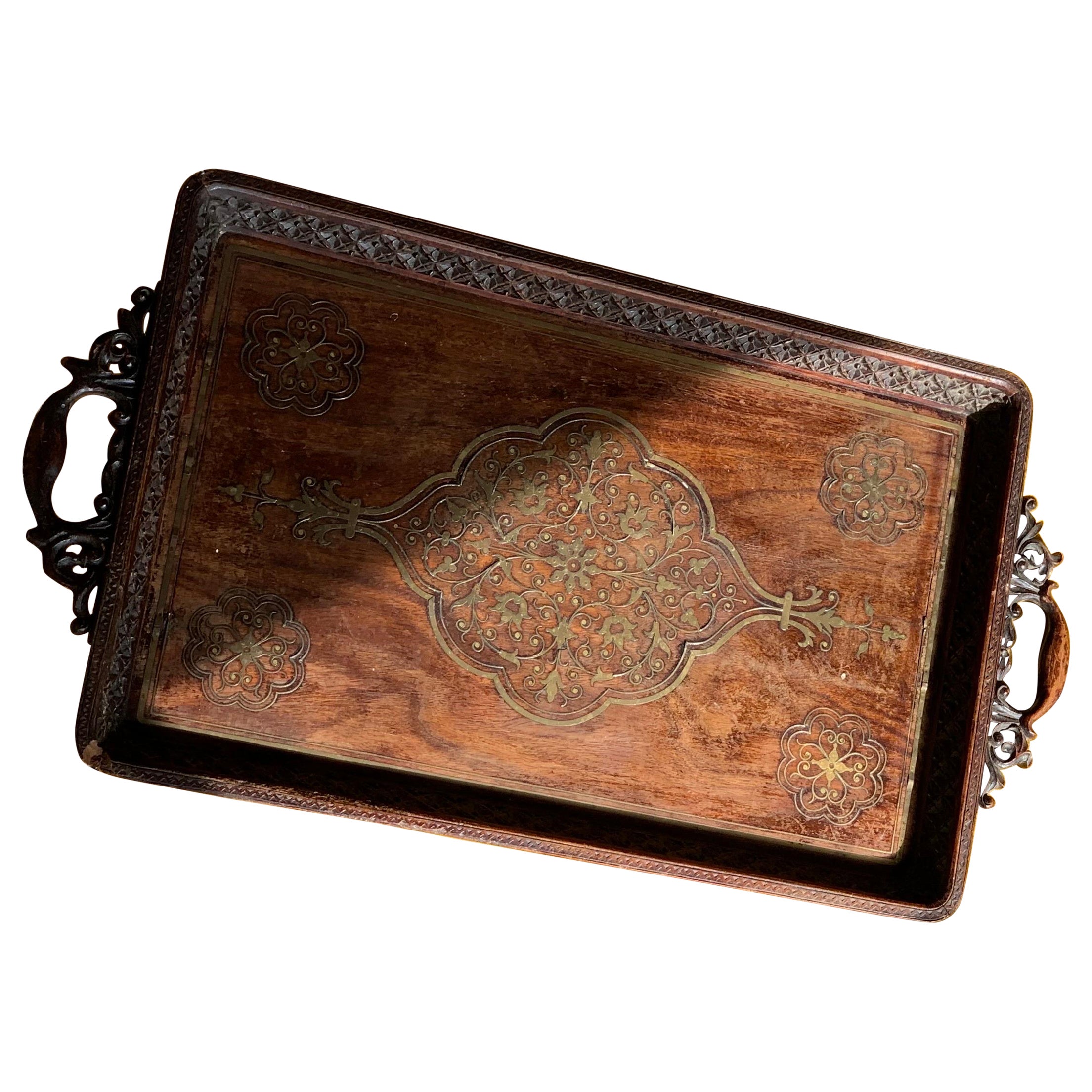 A carved padouk and inlaid brass tray of excellent colour and wear.

Late Nineteenth Century

Inquire about this piece