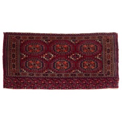 Roter antiker persischer Turkmen-Wollteppich aus Turkmen mit geometrischem Muster