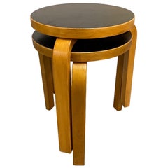 A Pair of Alvar Aalto Stools Model no 60, Black Laminate, Artek 1950s