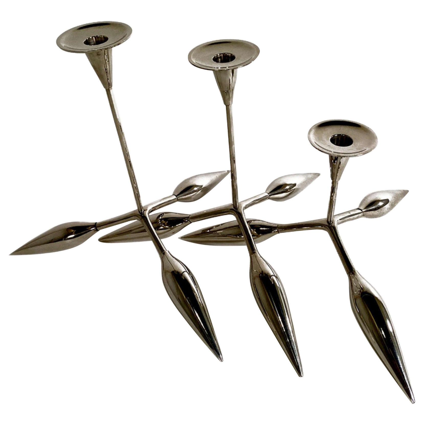A Set of 3 Italian Modern Chrome Candle Sticks