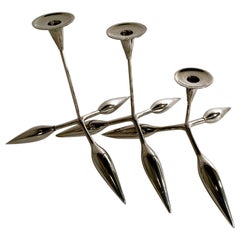 A Set of 3 Italian Modern Chrome Candle Sticks