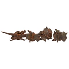 Ensemble de 4 presse-papiers médaillons américains en acier patiné Albert Paley