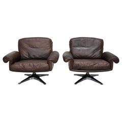 Paar Vintage De Sede DS-31 Drehsessel aus braunem Leder