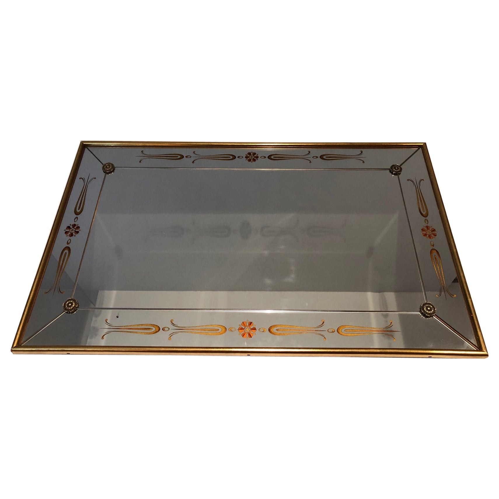 Important Mirror Engraved with Gold and Red Decorations. French work. Circa 1970