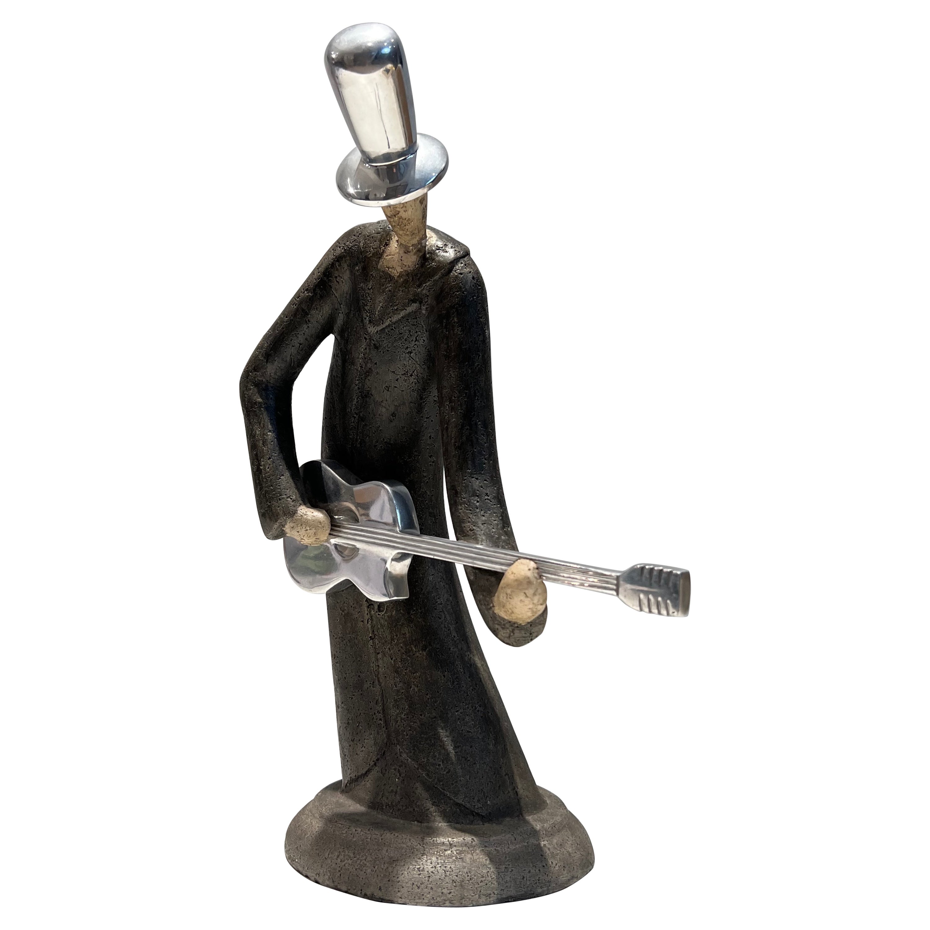 Escultura de un guitarrista en venta