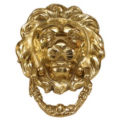 Aldabas inglesas georgianas de latón con forma de león