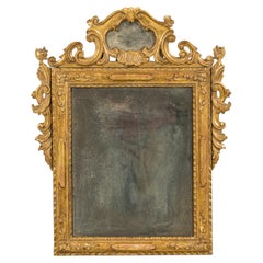 Espejo italiano rococó de madera dorada S. XVIII