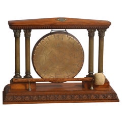 Oak and brass table gong