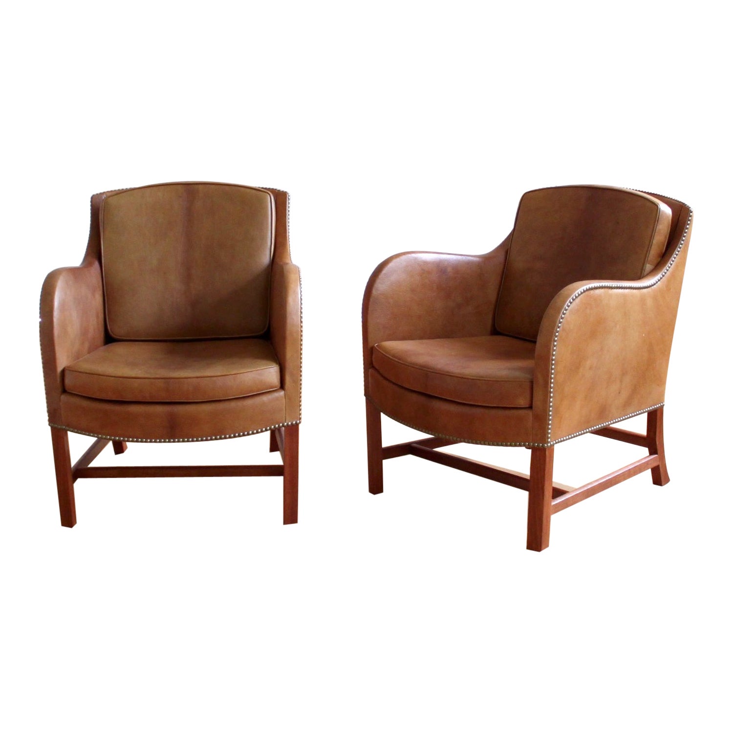 Exceptional pair of iconic Kaare Klint Mix Chairs in Niger Leather and Mahogany