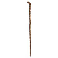 Antique A finely carved fruitwood cane with royal and masonic symbols