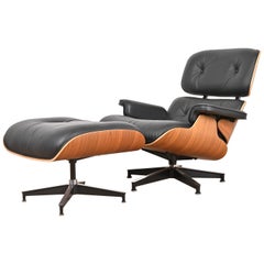 Charles & Ray Eames for Herman Miller Lounge Chair and Ottoman in Walnut
