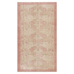 Alfombra vintage Zeki Müren beige con motivos florales rosas de Rug & Kilim