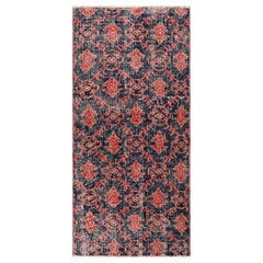 Alfombra vintage Zeki Müren azul marino con motivos geométricos rojos de Rug & Kilim