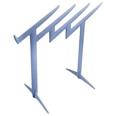 Claudia Evangelista magazine rack, designed by Philippe Starck for Kartell 1996