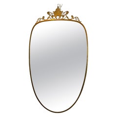 Gio Ponti style, Mid-Century mirror in brass. Italy 1950s