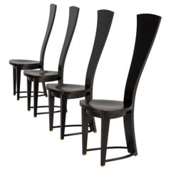 Set di 4 sedie con schienale alto in legno nero e piedi in ottone, anni '80