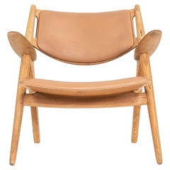 1960s Hans Wegner for Carl Hansen & Son CH28P Sawbuck Oak Lounge Chair