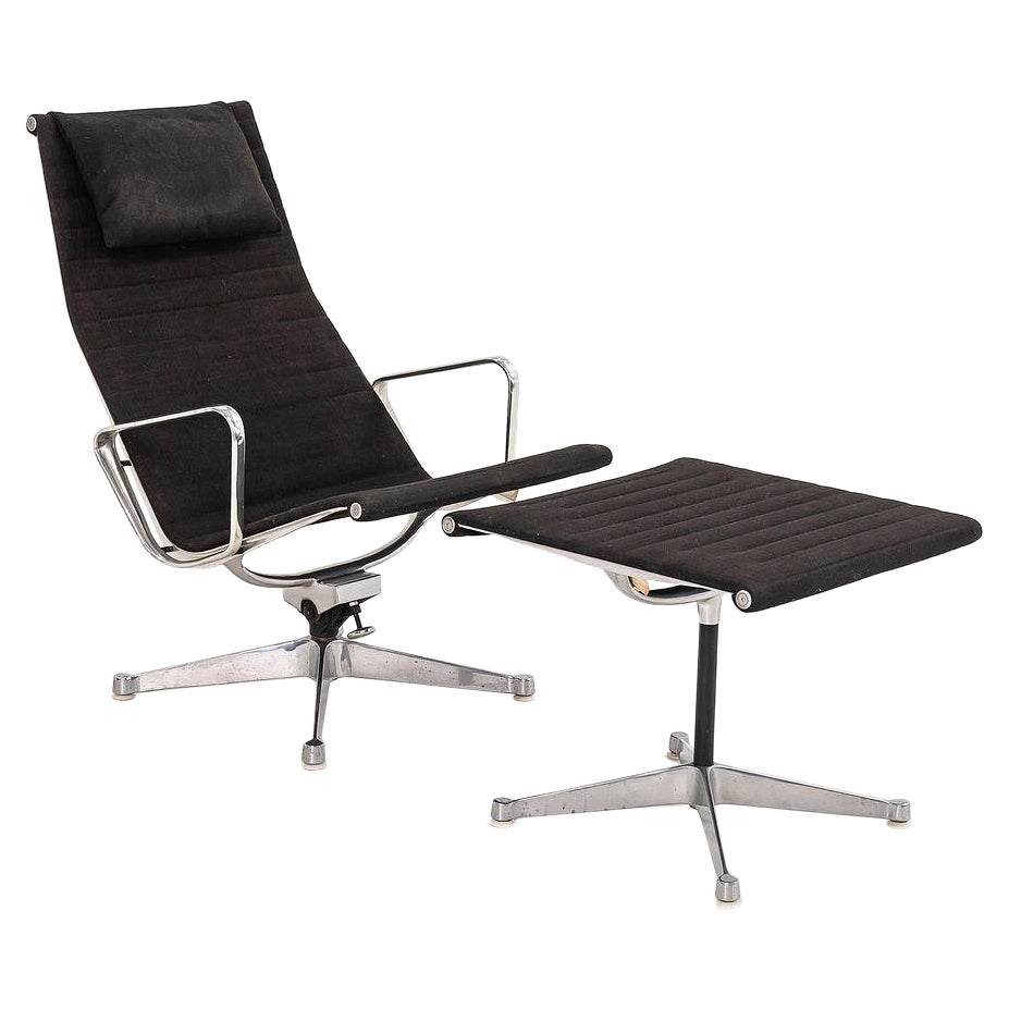 Herman Miller Eames Group Lounge Chair e Ottoman in alluminio del 1960 in tessuto