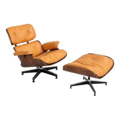 1962 Herman Miller Eames Lounge Chair and Ottoman in Brazilian Rosewood