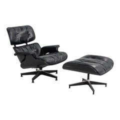 1963 Herman Miller Eames Lounge Chair and Ottoman in Wood w/ Leather Upholstery