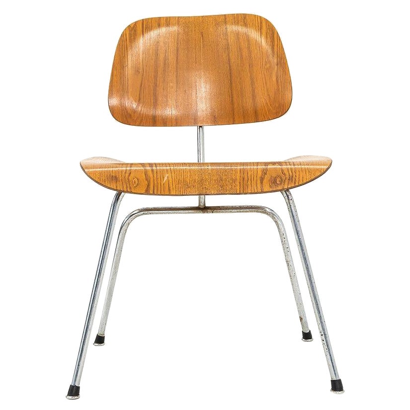 C. 1955 Charles and Ray Eames per Herman Miller Sedia DCM in frassino calico