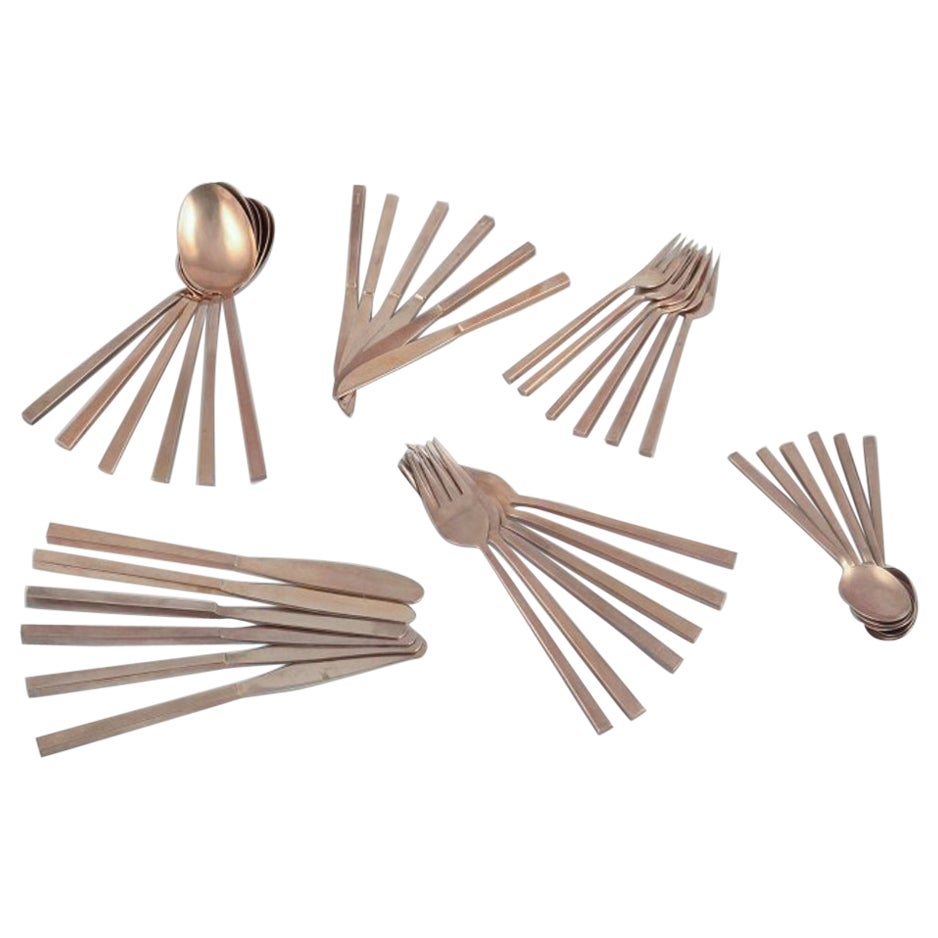 Couverts en laiton "Scanline" de Sigvard Bernadotte. Service de table pour six personnes. 36 Pieces