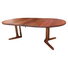 Dyrlund Danmark round dining table in solid teak with double insert plates 60s