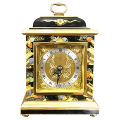 Reloj de chimenea decorado con Chinoiserie de Elliott