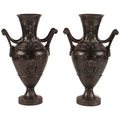Pair of Monumental Iron Urns, circa 1905