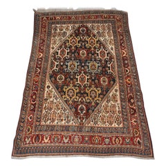 Alfombra antigua Qashqai Kashkuli con diseño de medallón repetido, Circa 1900