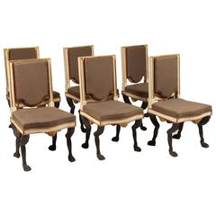 Set of Eight Ebonized Hollywood Regency Chairs