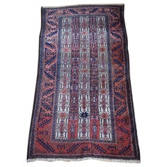 Alfombra antigua Baluch con escaso diseño de rayas de fondo blanco, Circa 1900