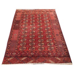 Antiker Tekke Turkmenischer Teppich mit warmer roter Farbe, um 1900