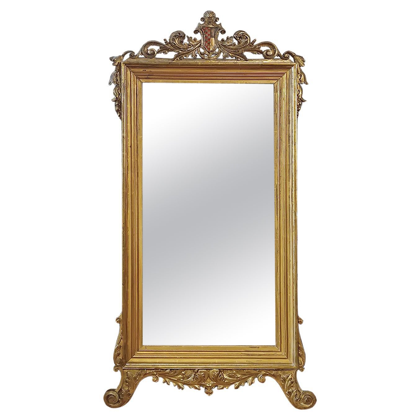 EARLY 19th CENTURY GOLDEN MIRROR WITH COAT OF ARMS